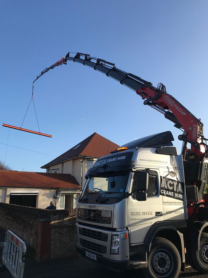 ACTA Crane Hire Lifting a steel beam